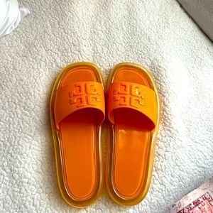 Orange Tory Burch slides
